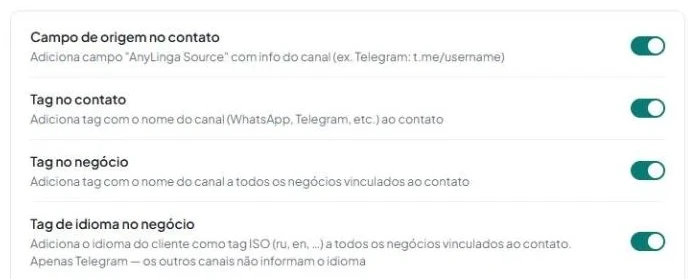 Aba «Automatizações» com as opções «Campo de origem no contato», «Tag no contato», «Tag no negócio» e «Tag de idioma no negócio» ativadas.
